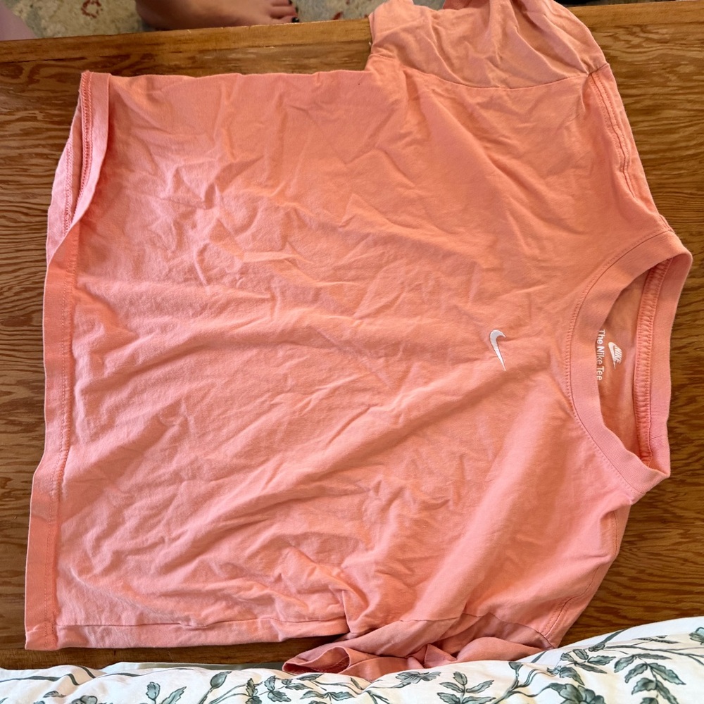 Nike Coral-Orange Loose Fit Tee with White Swoosh
